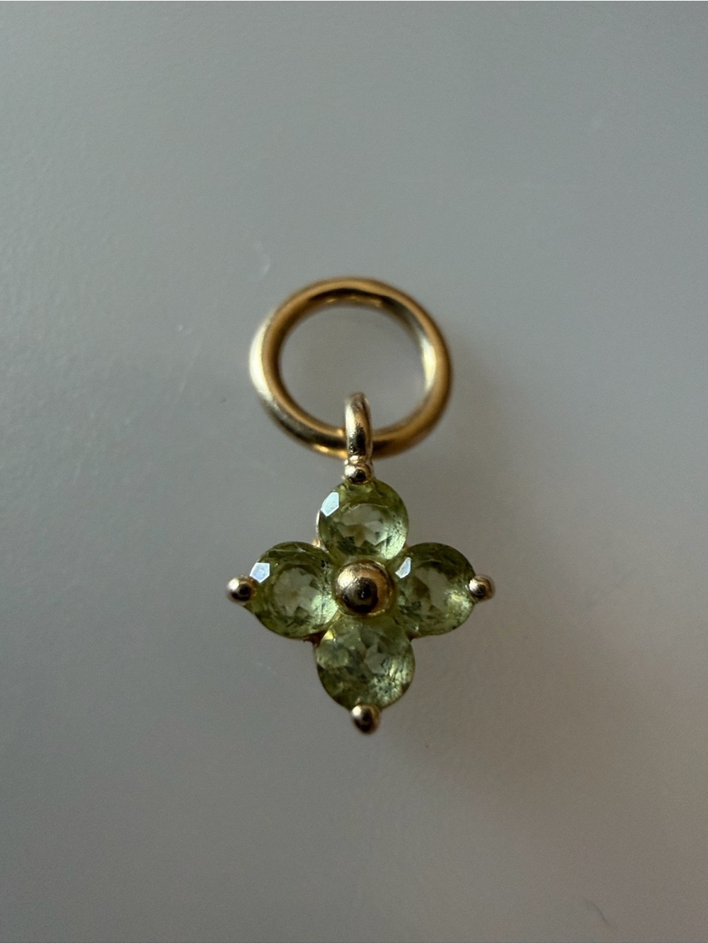 Mejuri 14K pendant charm with green peridot gemstones